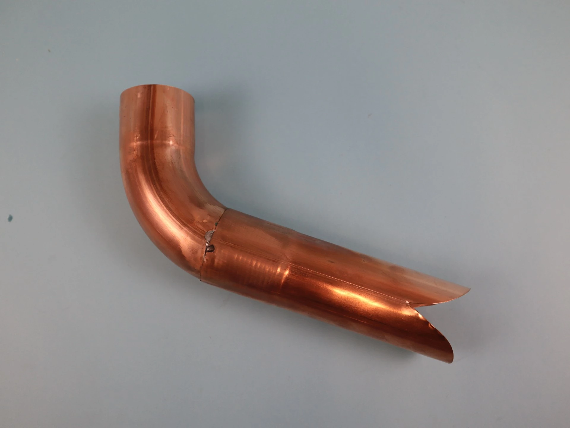 Wasserspeier mit Bogen - Kupfer